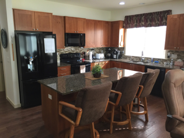 Kitchen has large Island and breakfast bar